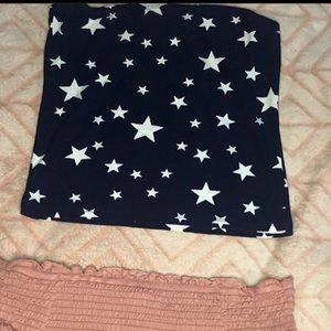 a blue and stars designed tube top.